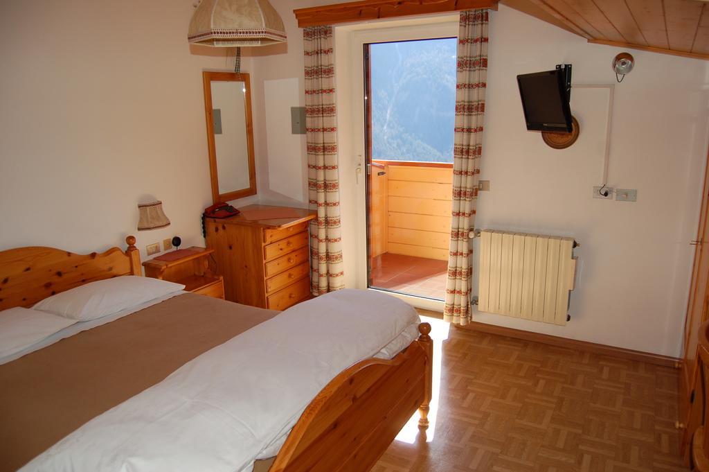 Hotel MILLEFIORI Vigo di Fassa Zimmer foto